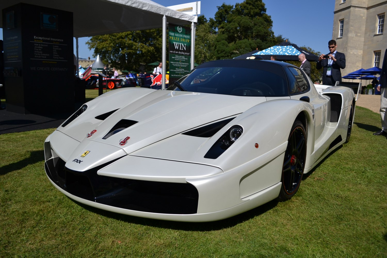 White aerodynamic sports vehicle front with air intakes