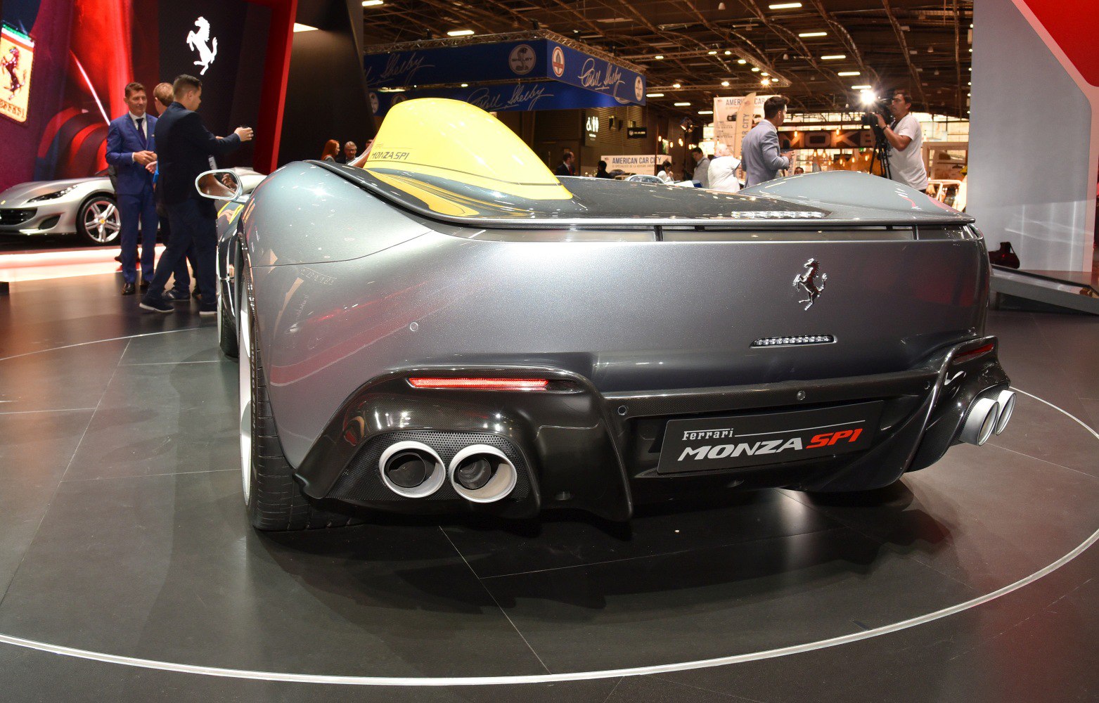 Rear view highlighting dual exhausts and aerodynamic rear design