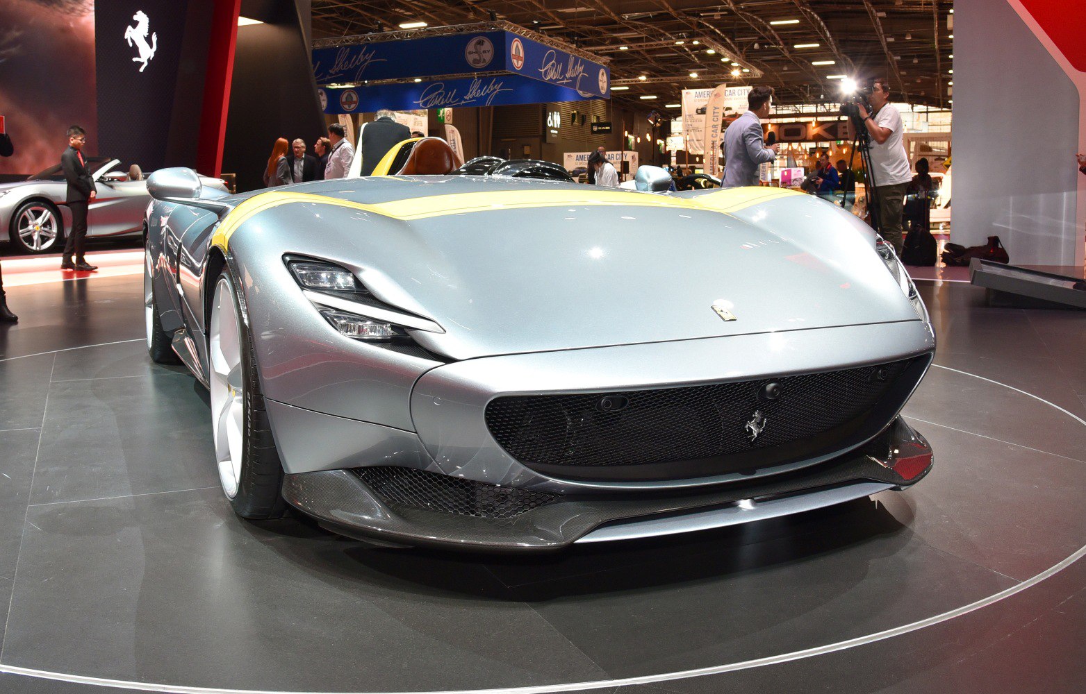 Sleek aerodynamic front with aggressive LED headlights and large grille
