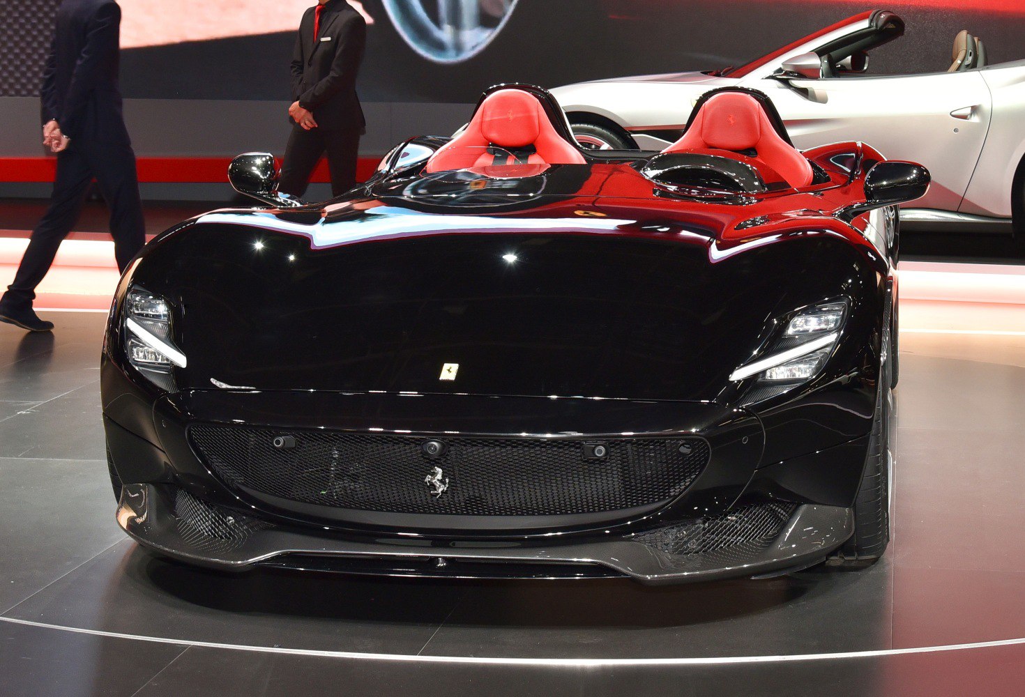 Dual cockpit seats with LED headlights front view