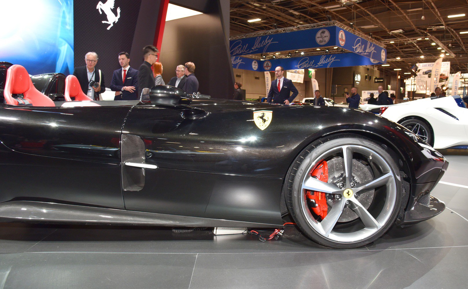 Side profile with red brake calipers and aerodynamic side details