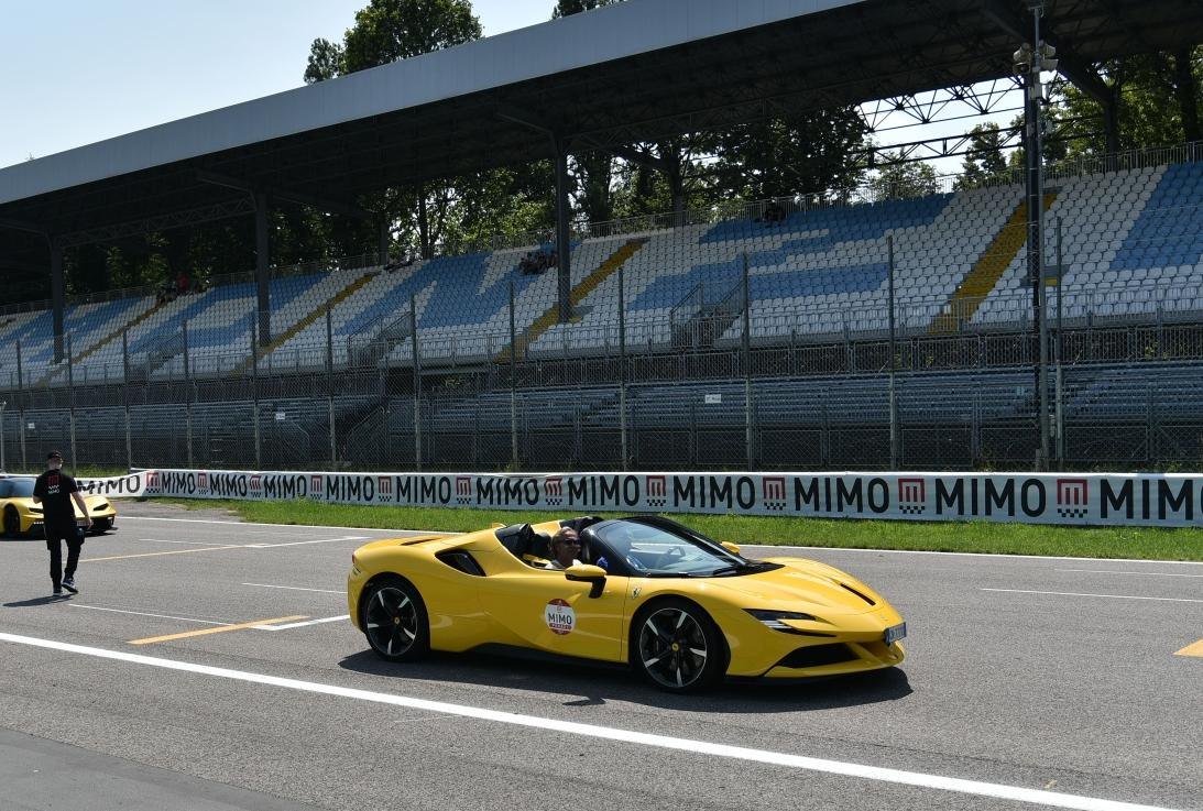 Yellow convertible sports car on a race track