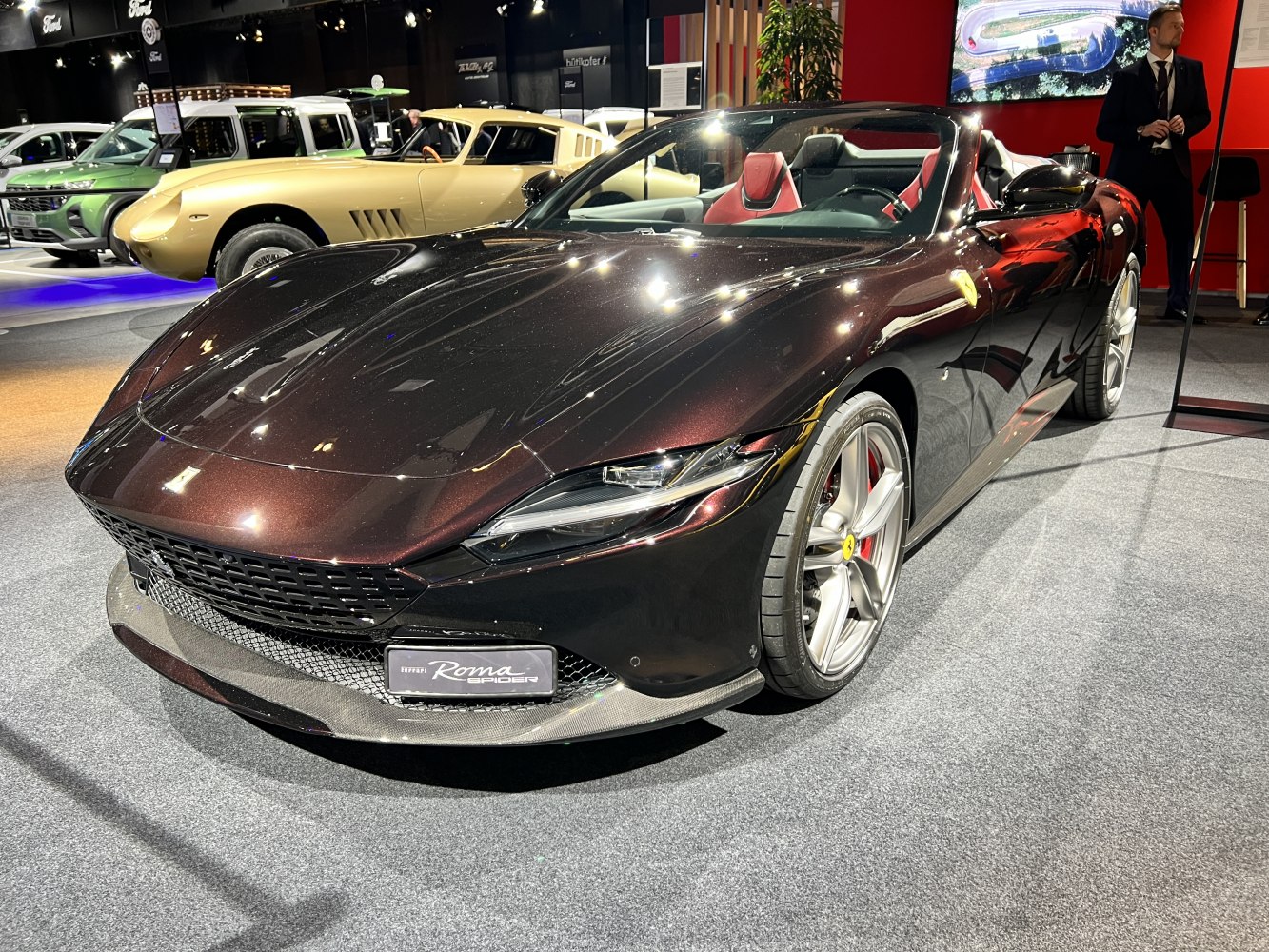 Convertible front close-up with sporty wheels and aerodynamic design