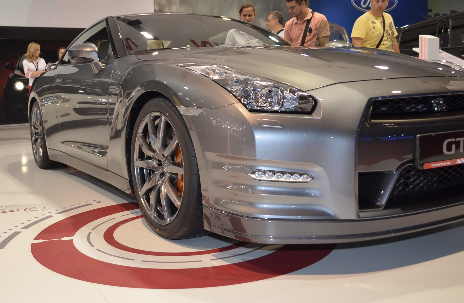 Front side close-up with modern headlights and alloy wheels