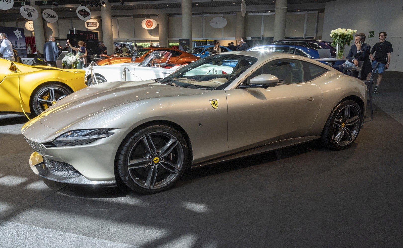 Sleek front side view of a luxury sports coupe with aerodynamic design and alloy wheels