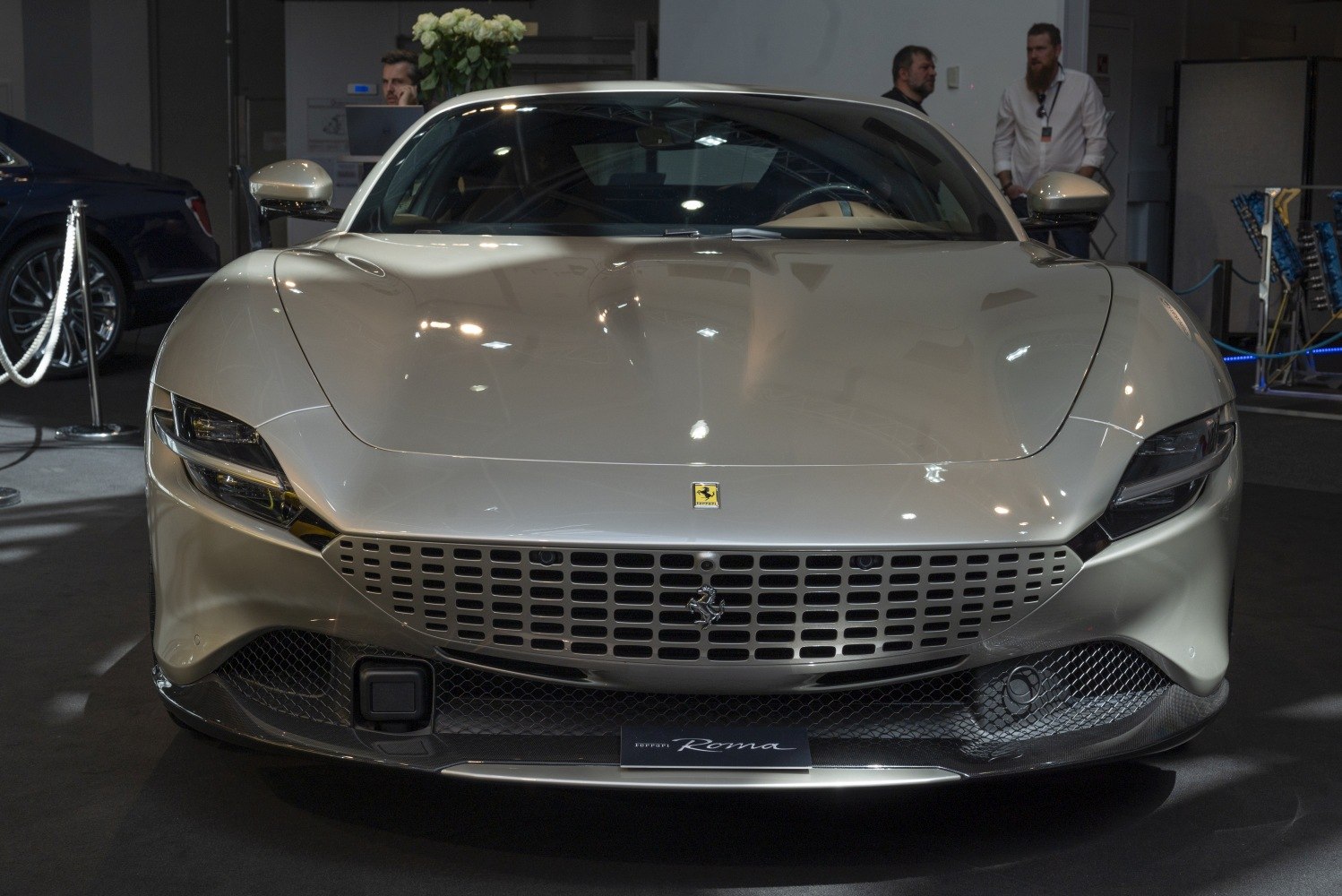 Front view with distinctive grille and sleek headlights.