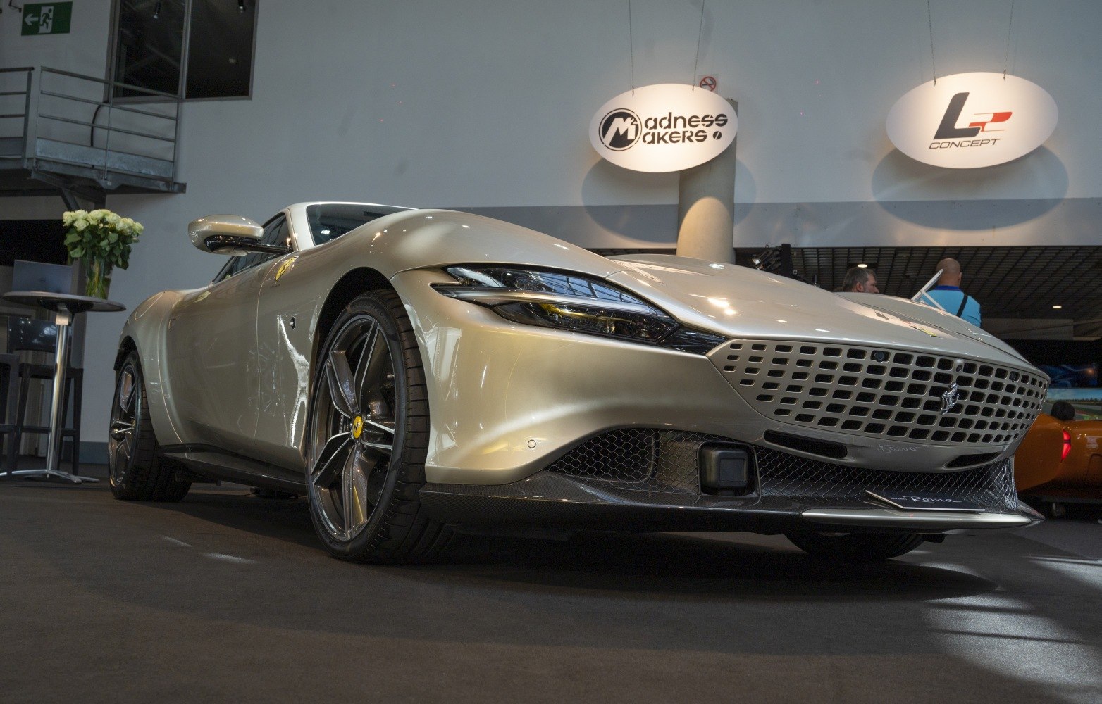 Close-up of front grille, LED headlights, and alloy wheels