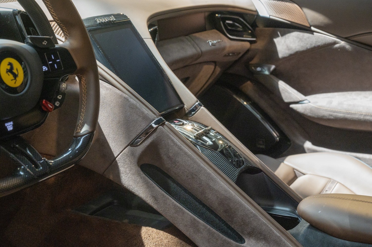 Luxury interior with digital display and ergonomic center console.