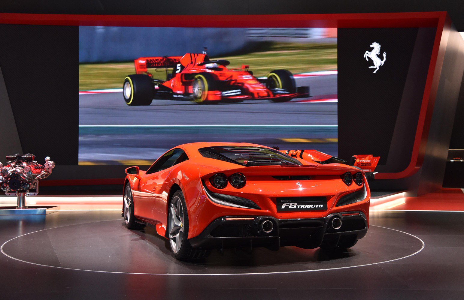 Rear view of Ferrari F8 Tributo with visible engine display and aerodynamic details