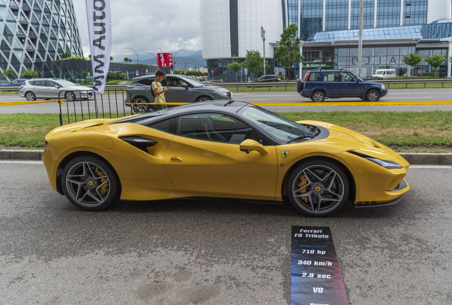 Yellow sports car side profile with detailed performance specifications