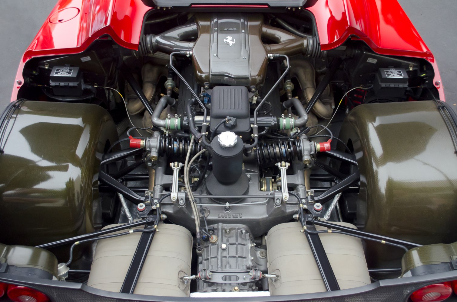 Detailed mid-engine and suspension layout of a high-performance sports car