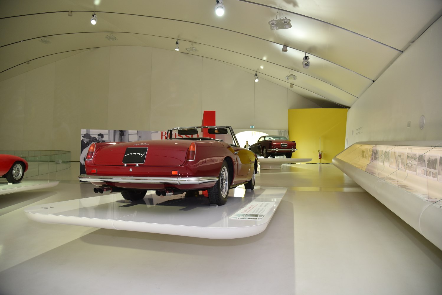 1950s vintage convertible rear view with dual exhausts