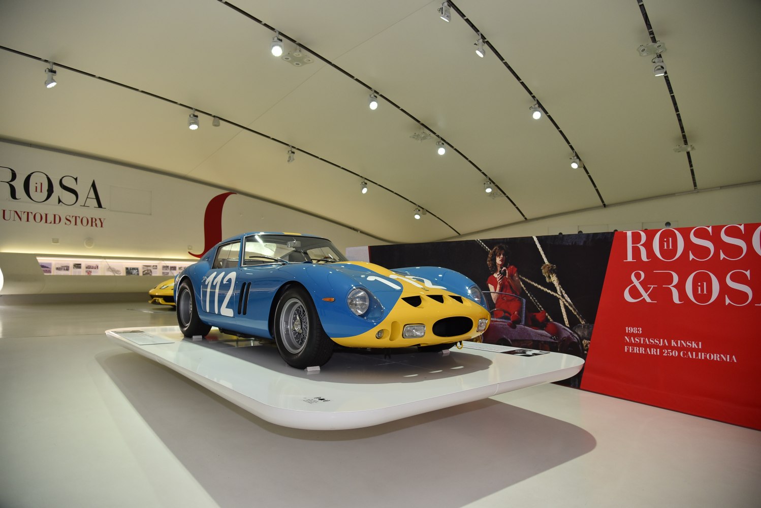 1960s vintage sports racing car with blue and yellow aerodynamic body