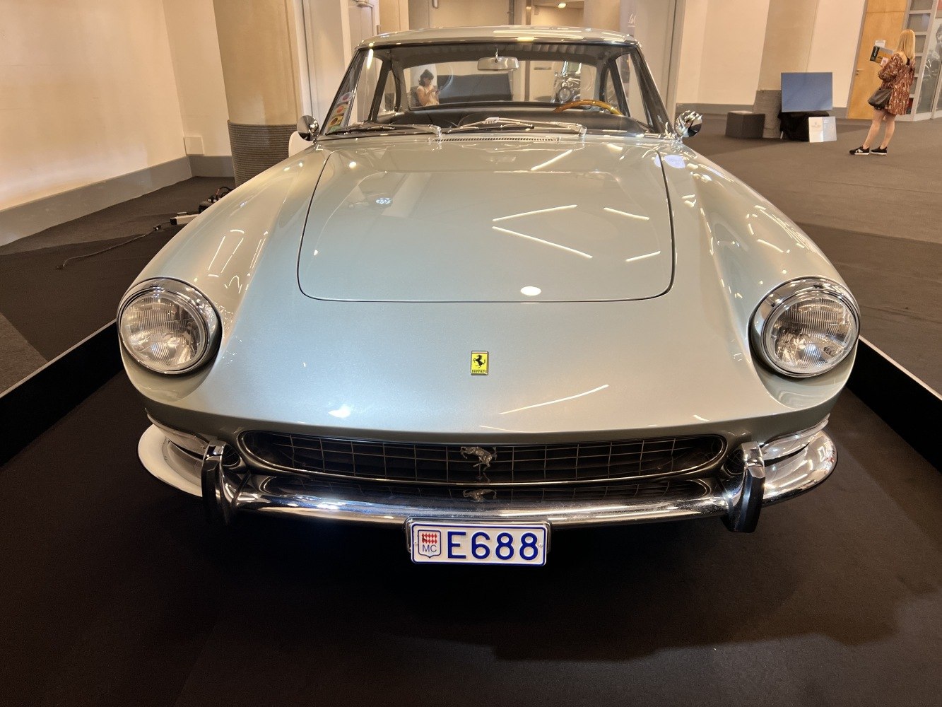 Classic vintage coupe with round headlights and chrome grille.