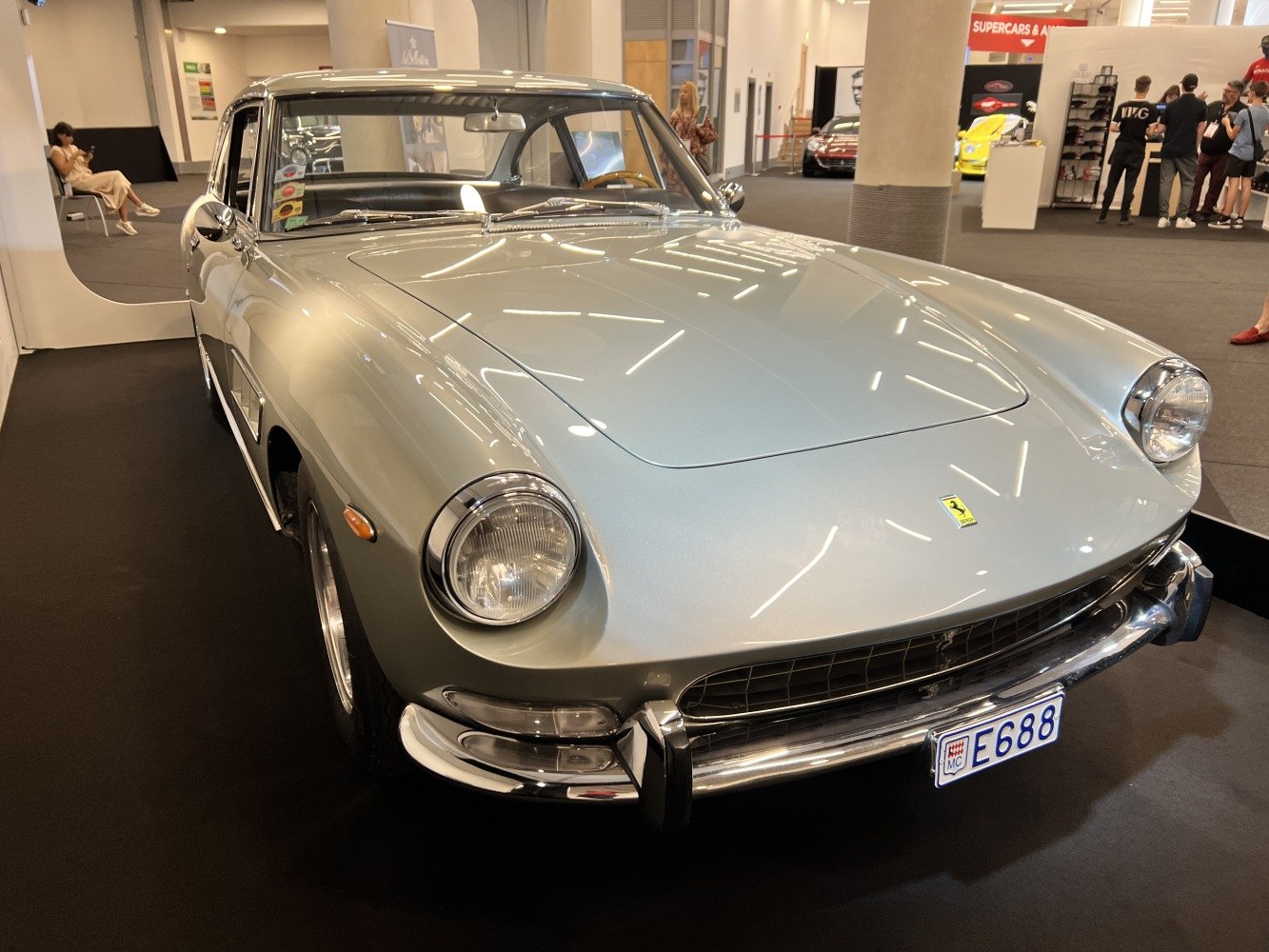 Front view of a vintage coupe with rounded headlights and chrome bumper