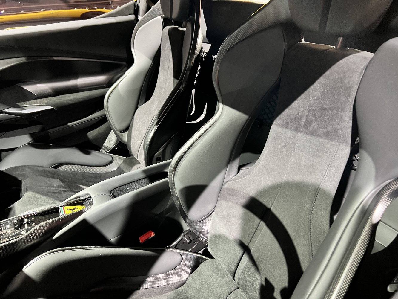 Sporty bucket seats with carbon fiber trim