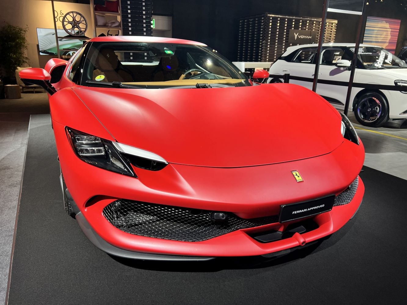 Aerodynamic front view with LED headlights and aggressive grille