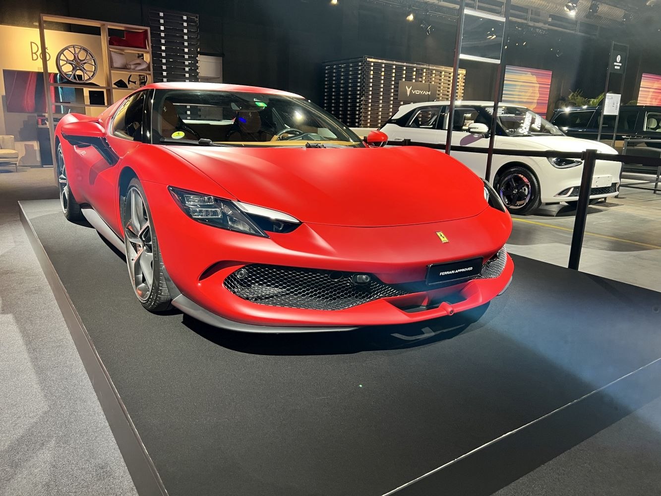 Red sports coupe with aerodynamic design and LED headlights