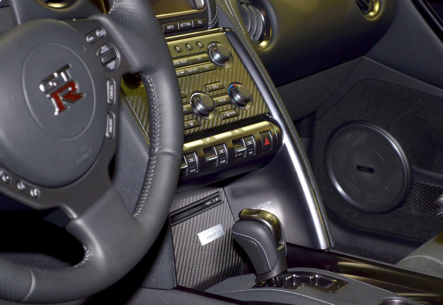 Steering wheel with GT-R logo, carbon fiber center console, gear shifter