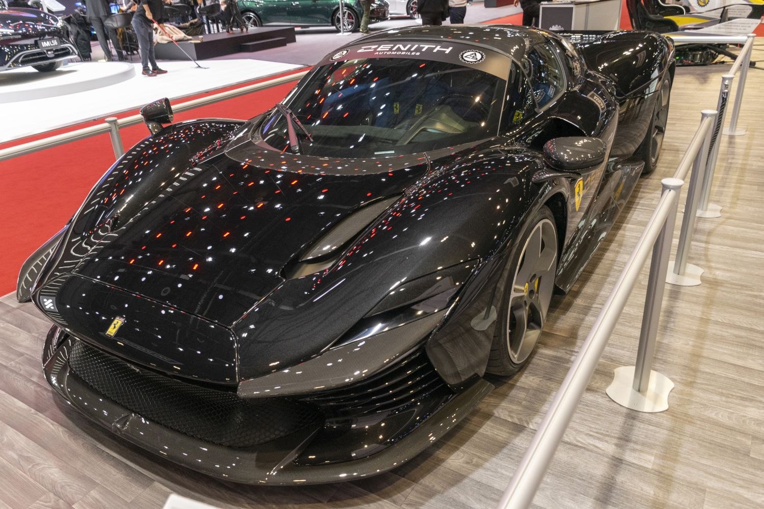 Aerodynamic sports coupe with smooth carbon fiber accents