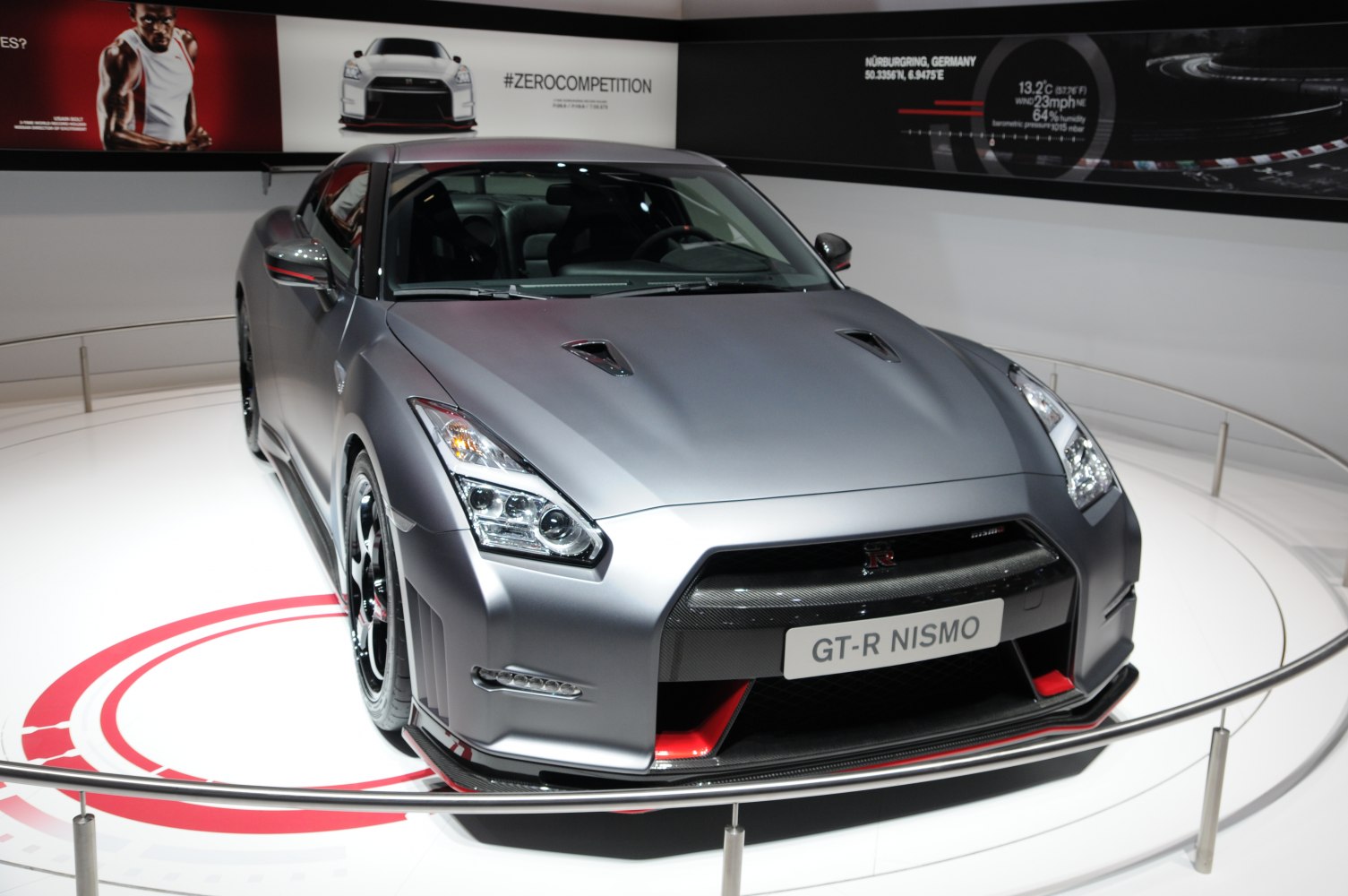 Aggressive front fascia with hood vents and distinctive headlights.