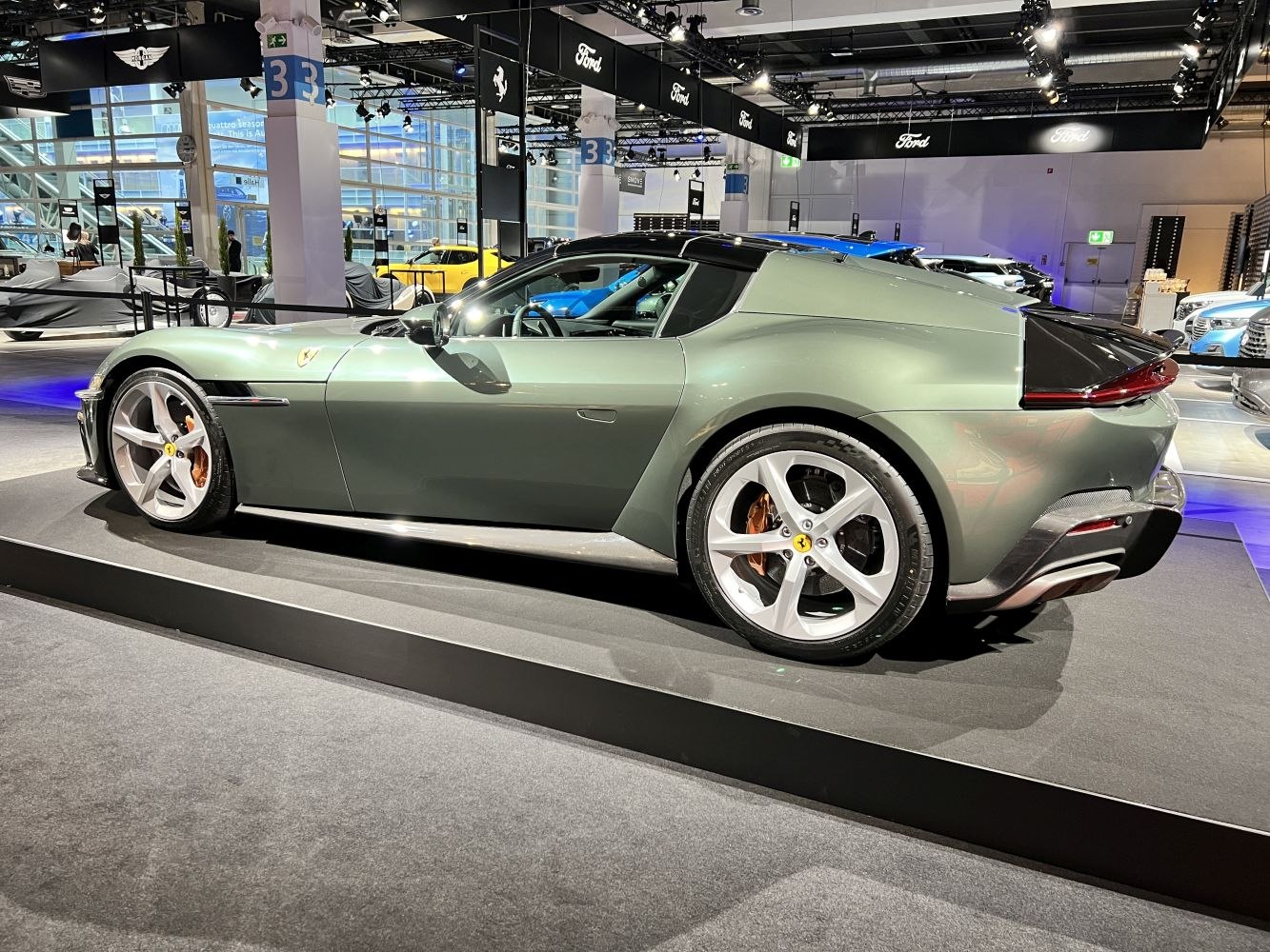 Sleek sports coupe with convertible roof and alloy wheels