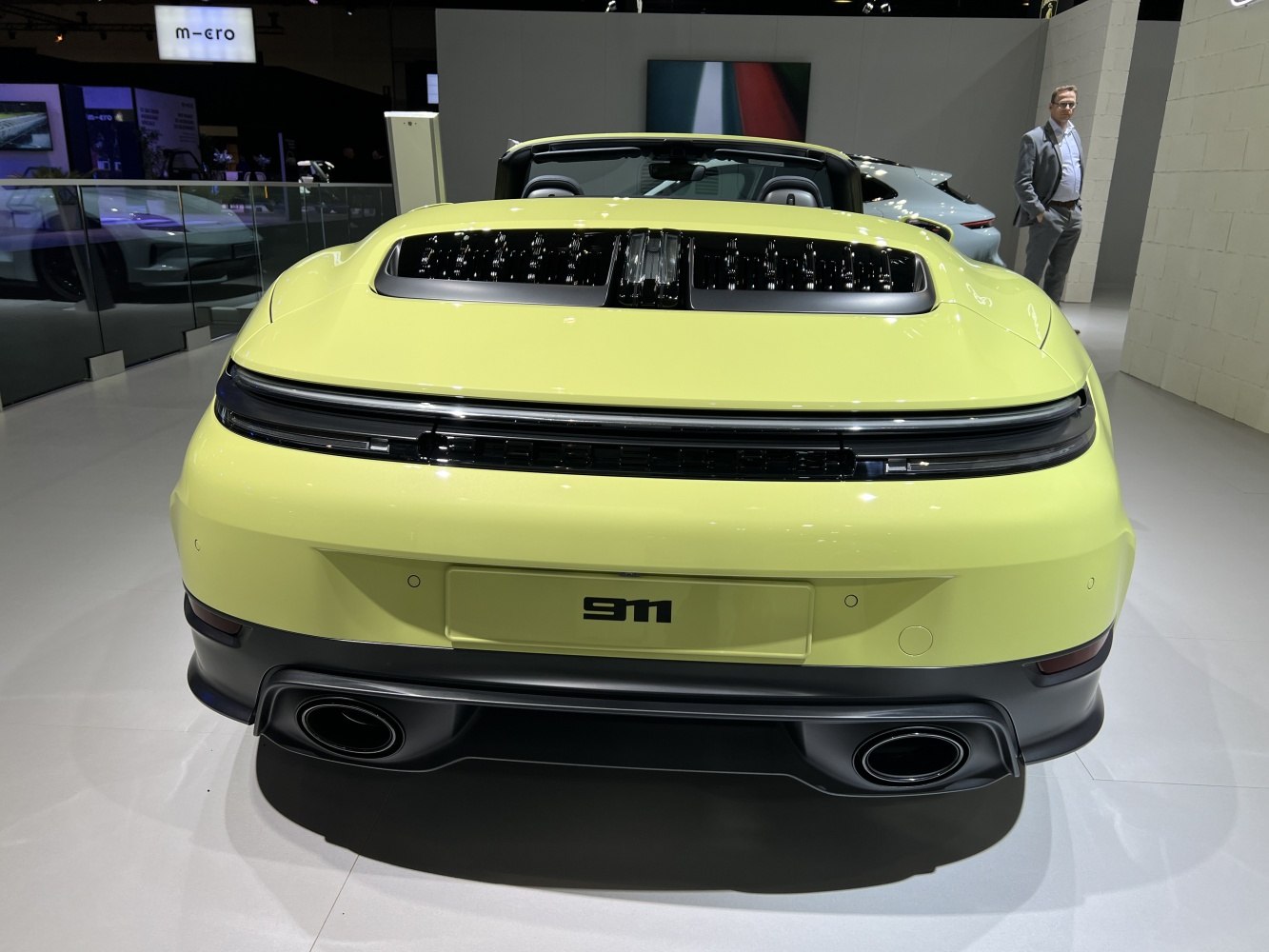 Rear view of sporty convertible with dual exhausts