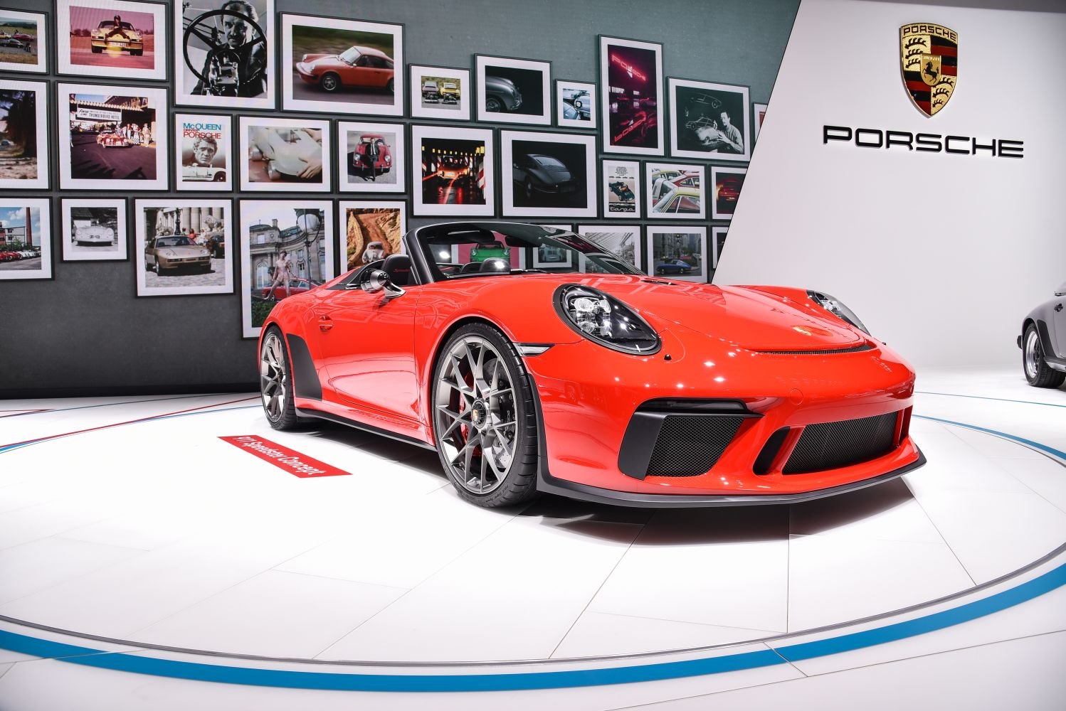 Red convertible sports car with aggressive front bumper and aerodynamic styling