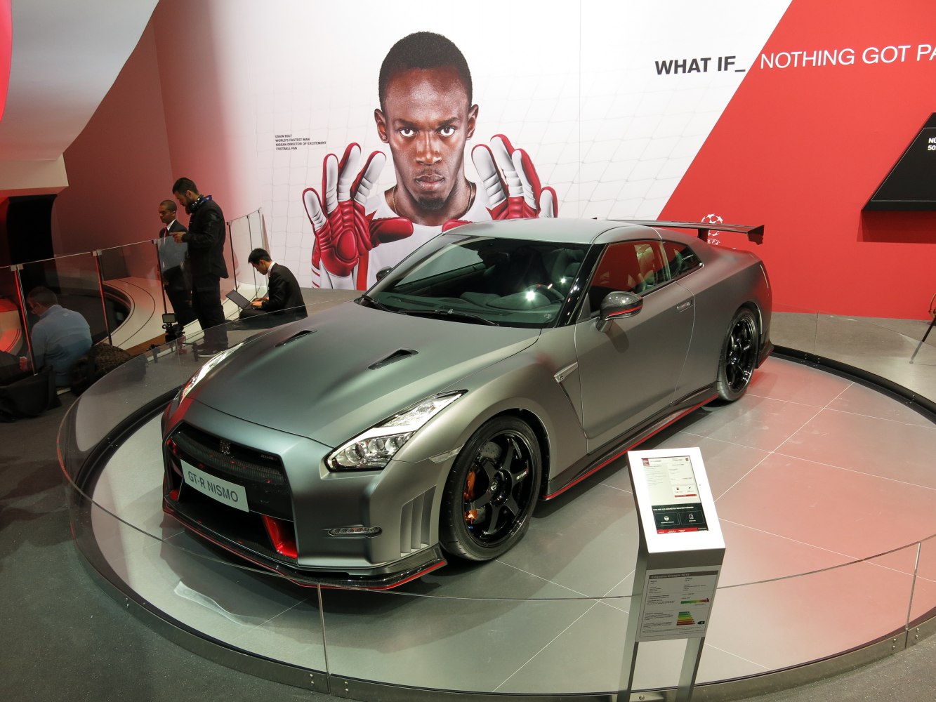 Aggressive front and side view with aerodynamic features and prominent rear wing