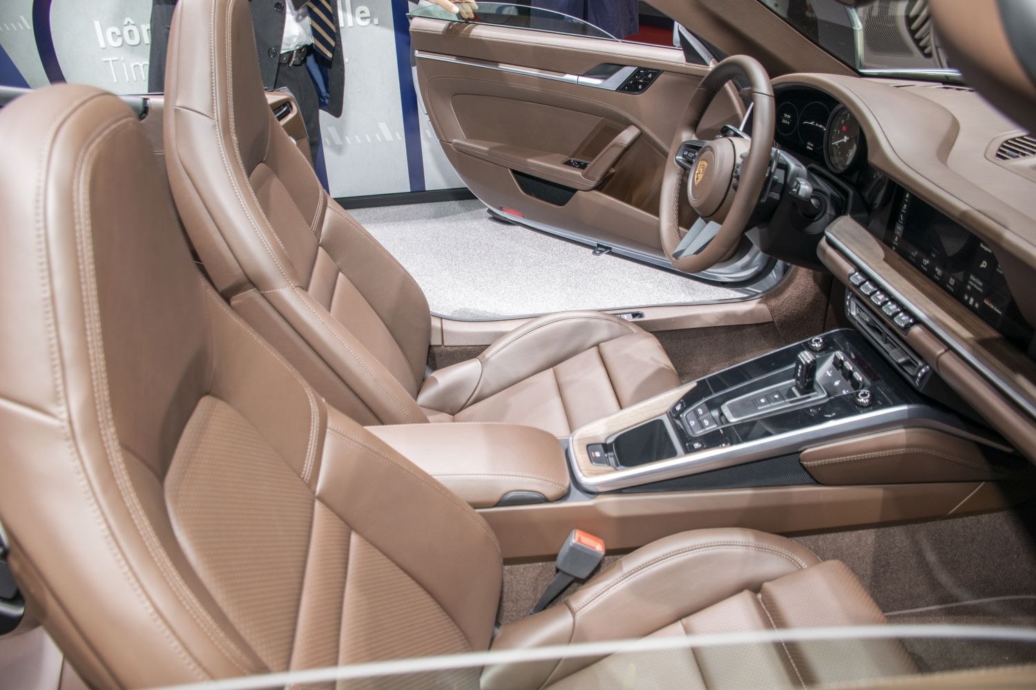 Luxury brown leather seats and modern central console with automatic gear shifter