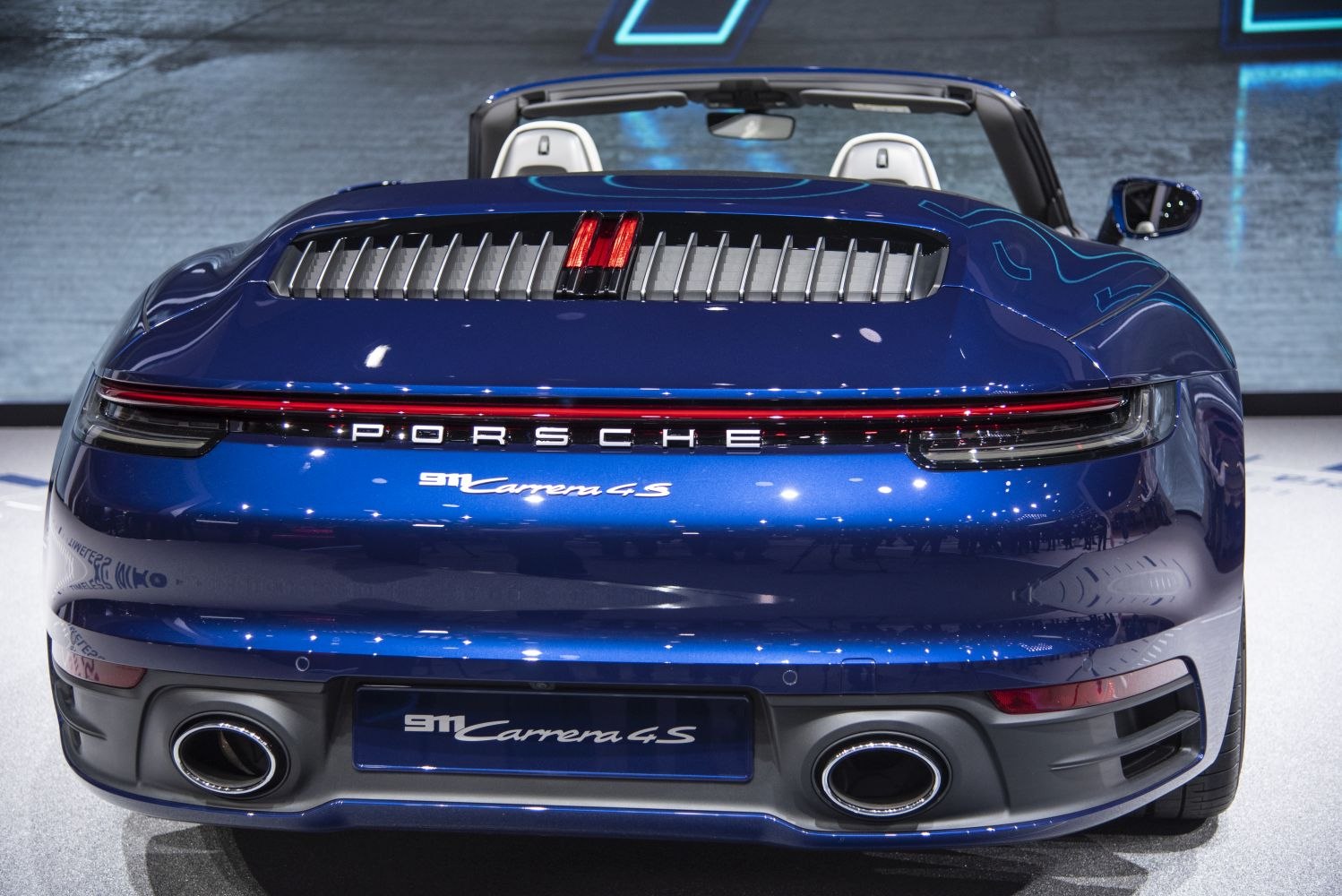 Rear design featuring twin exhaust outlets and rear grille.