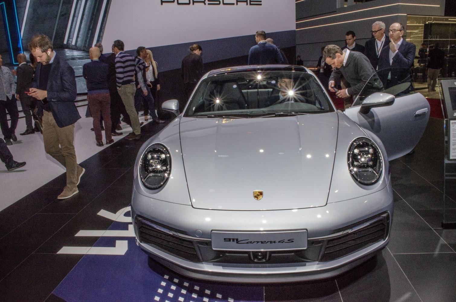 Front view with distinct headlights and aerodynamic hood design