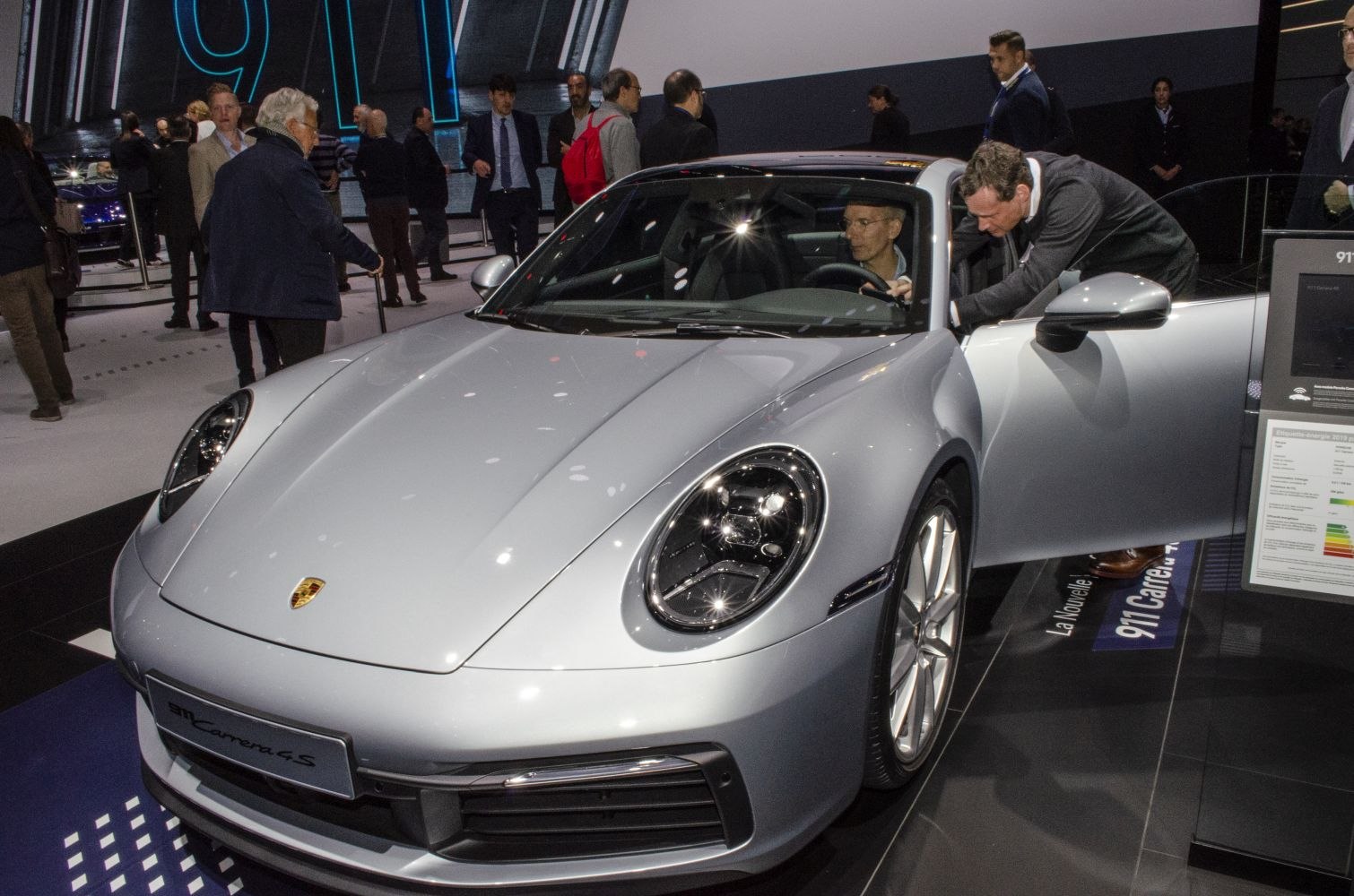 Front angle view with headlights and aerodynamic hood design
