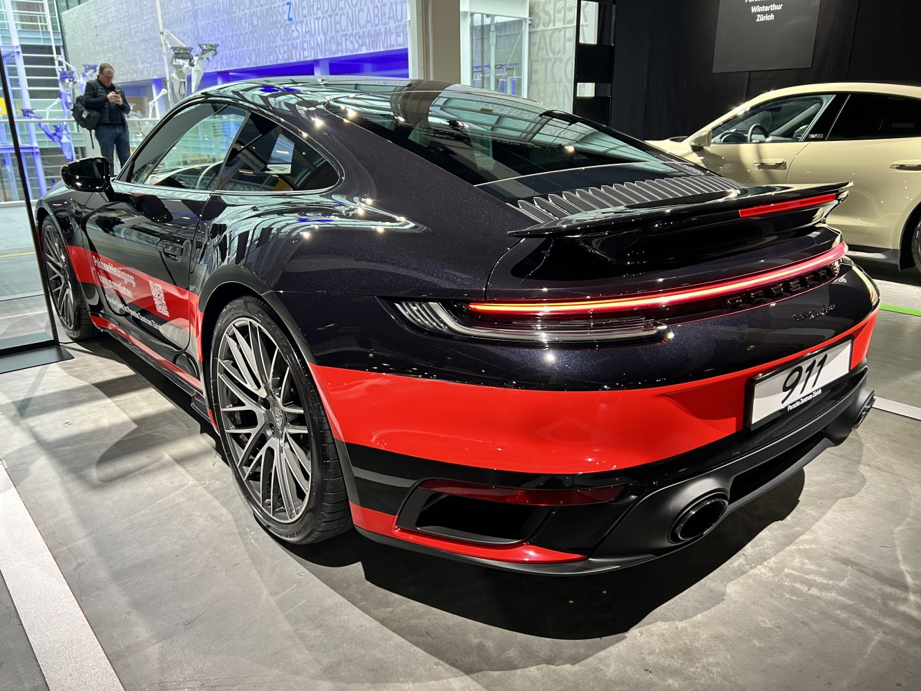 Rear view with LED taillight strip and aerodynamic spoiler