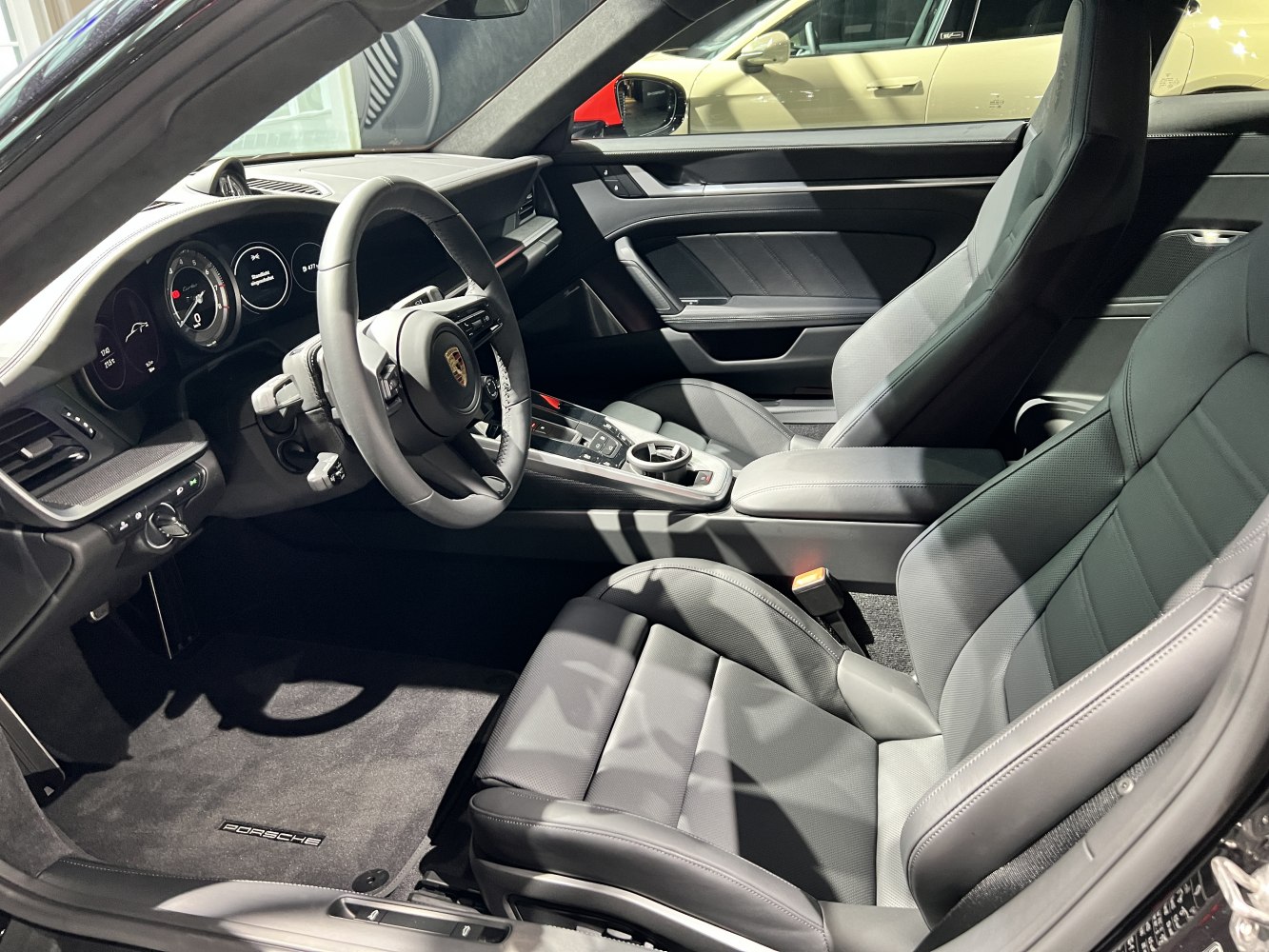 Luxurious leather seats and advanced dashboard of a sports coupe