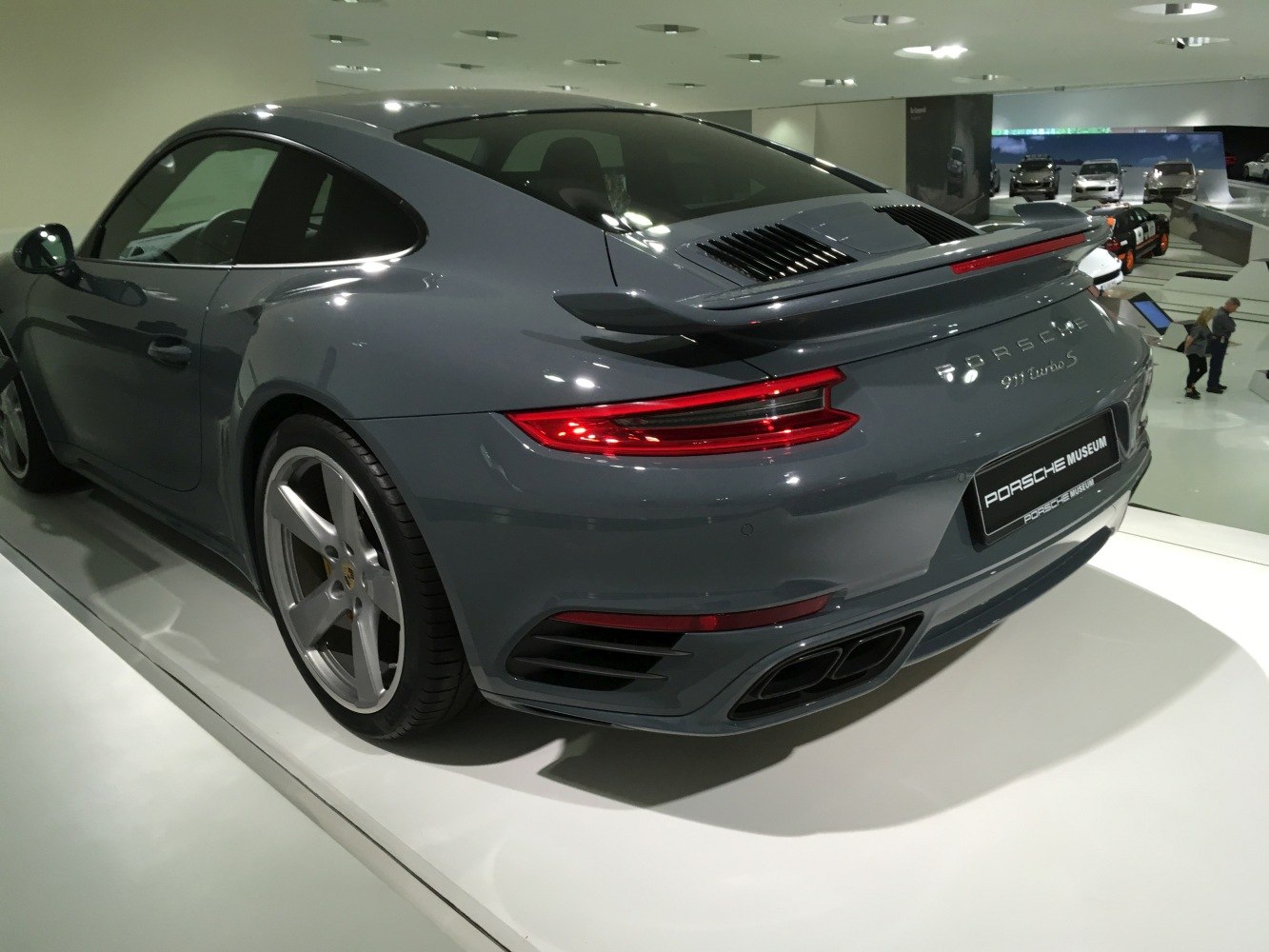 Rear view of a Porsche 911 with distinctive taillights and rear spoiler