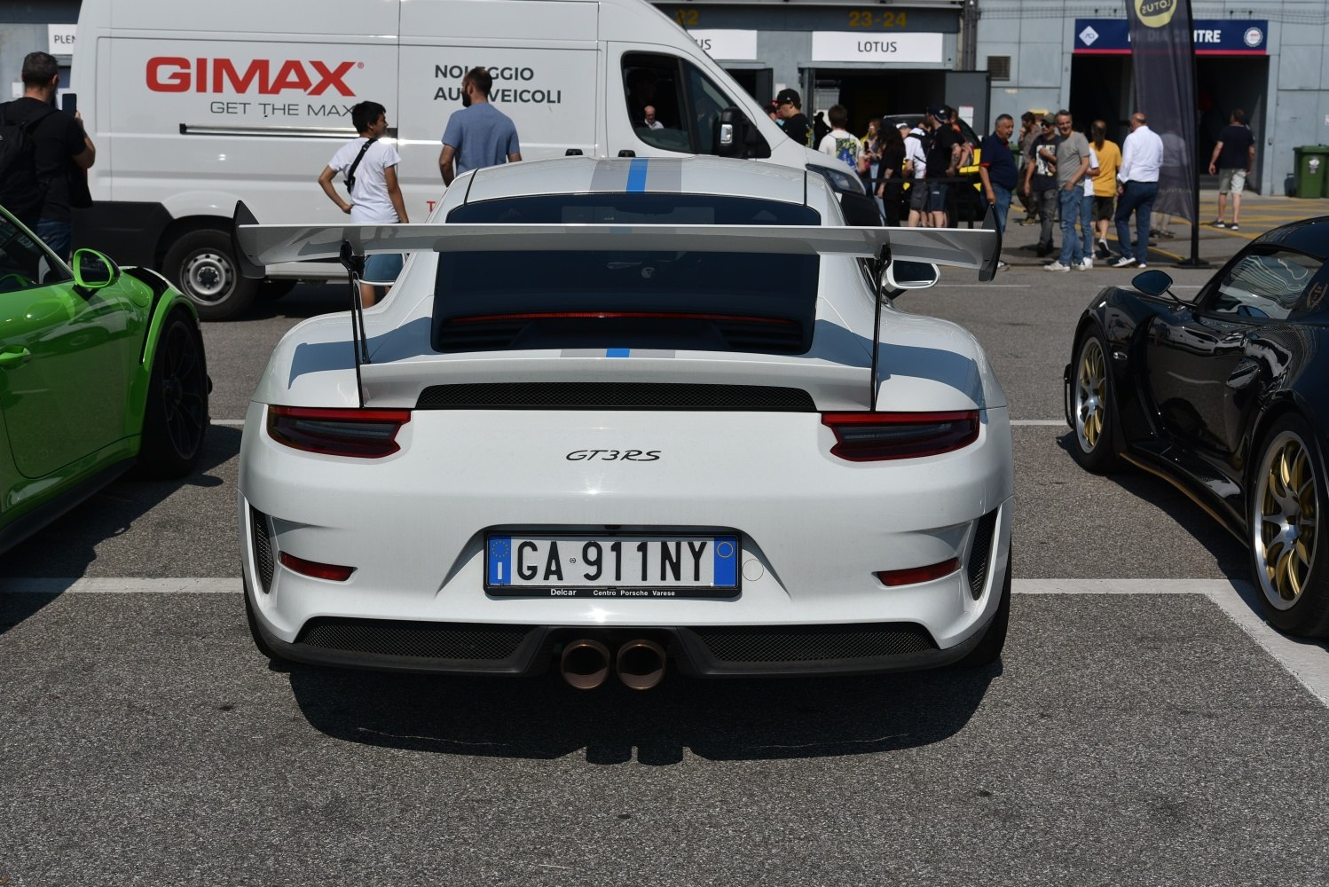 Rear view with large spoiler and dual exhaust