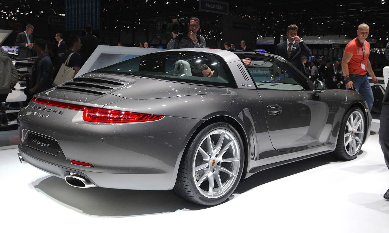 Rear view of a sports convertible with targa roof and dual exhausts