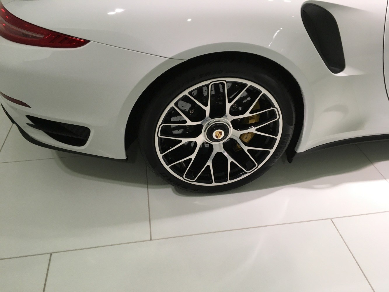 Rear wheel with alloy rim and visible performance brake disc