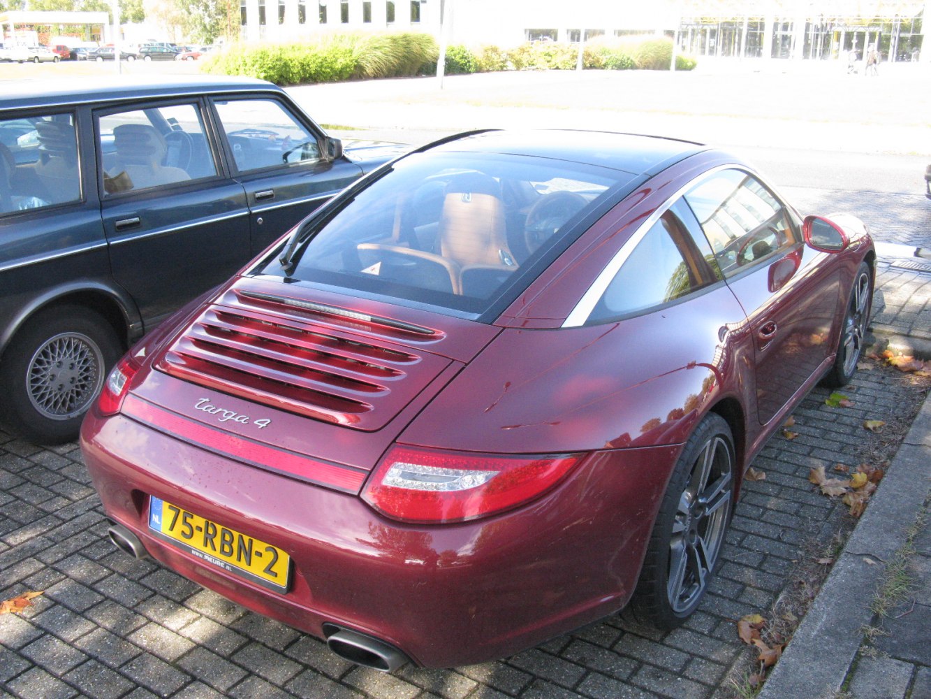 Rear engine vented decklid, distinctive rear window, dual exhaust pipes
