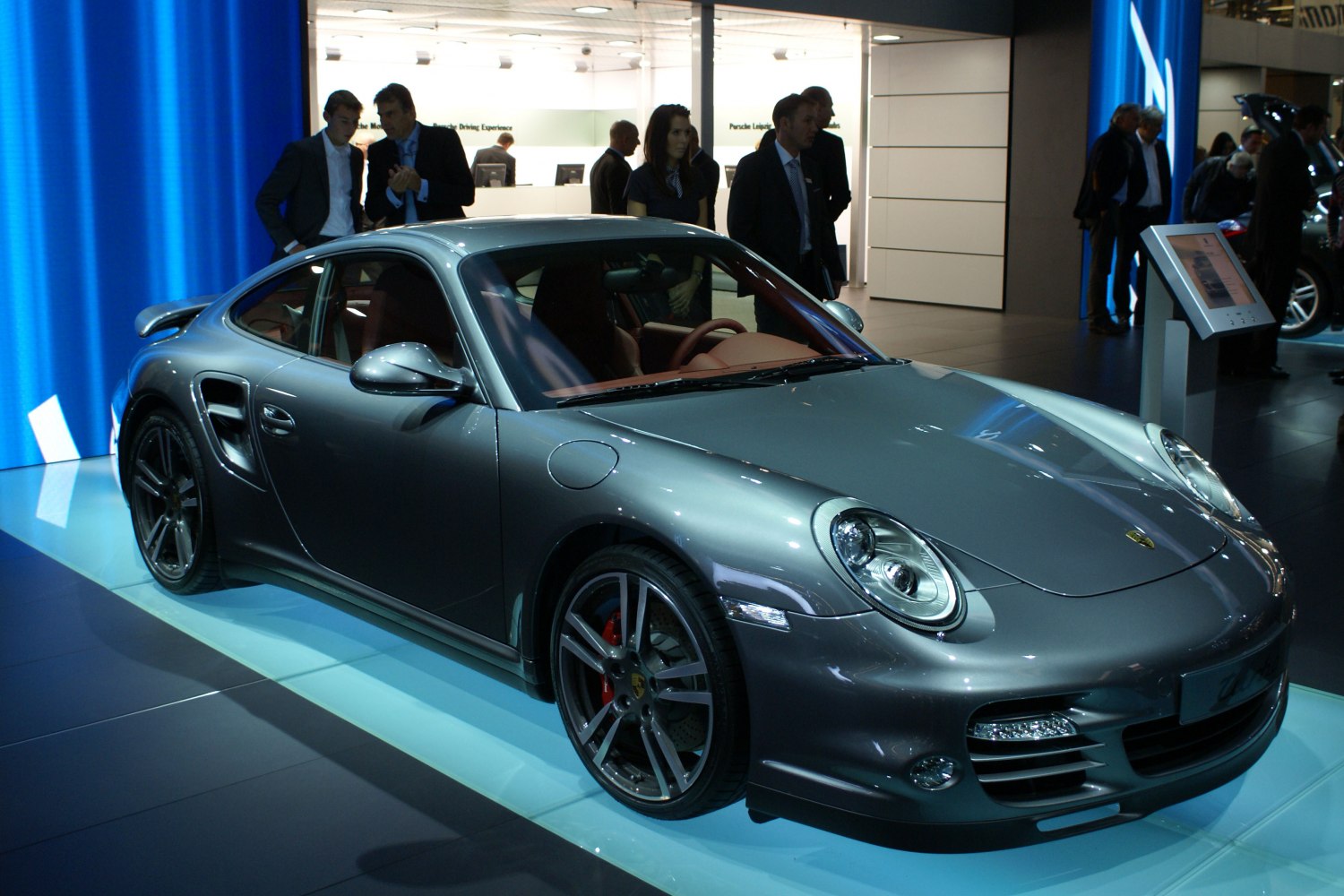 Sleek gray sports coupe with aerodynamic lines and alloy wheels