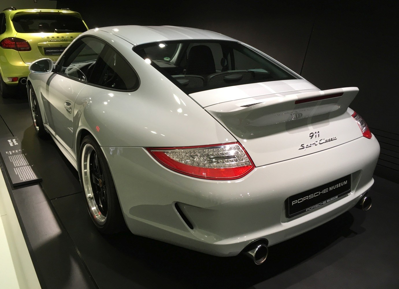 Rear view of a sports coupe with distinctive spoiler and tail lights