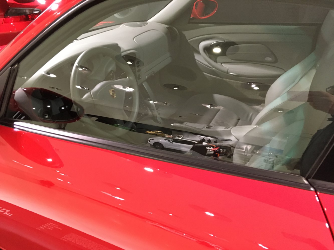Interior view with steering wheel and seat of sports coupe