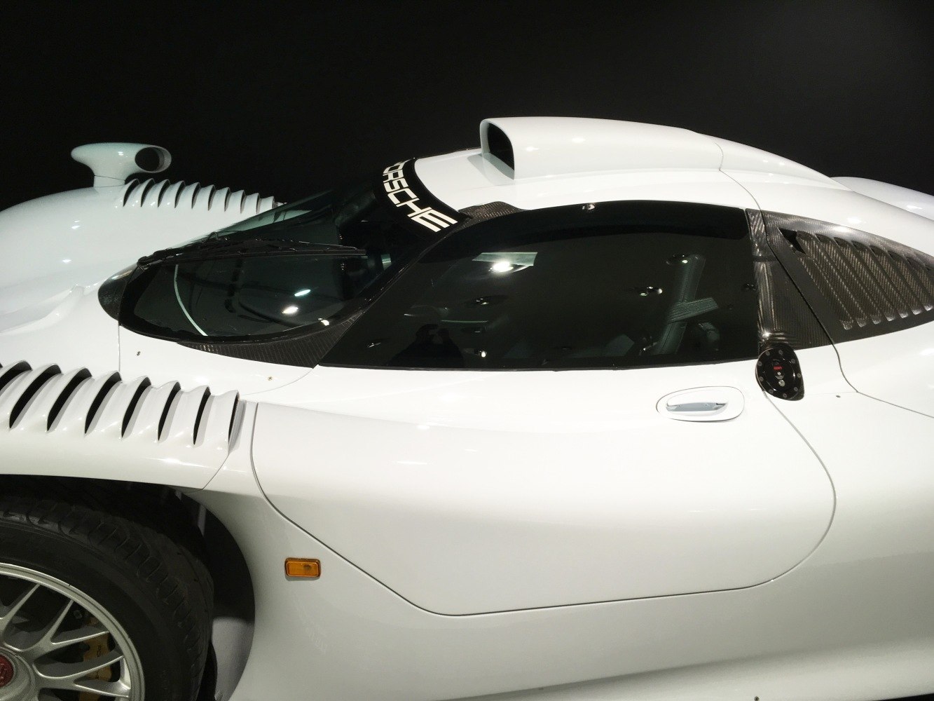 Side view with aerodynamic air intakes and sleek window design