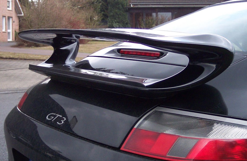 Close-up of rear wing spoiler and tail light.