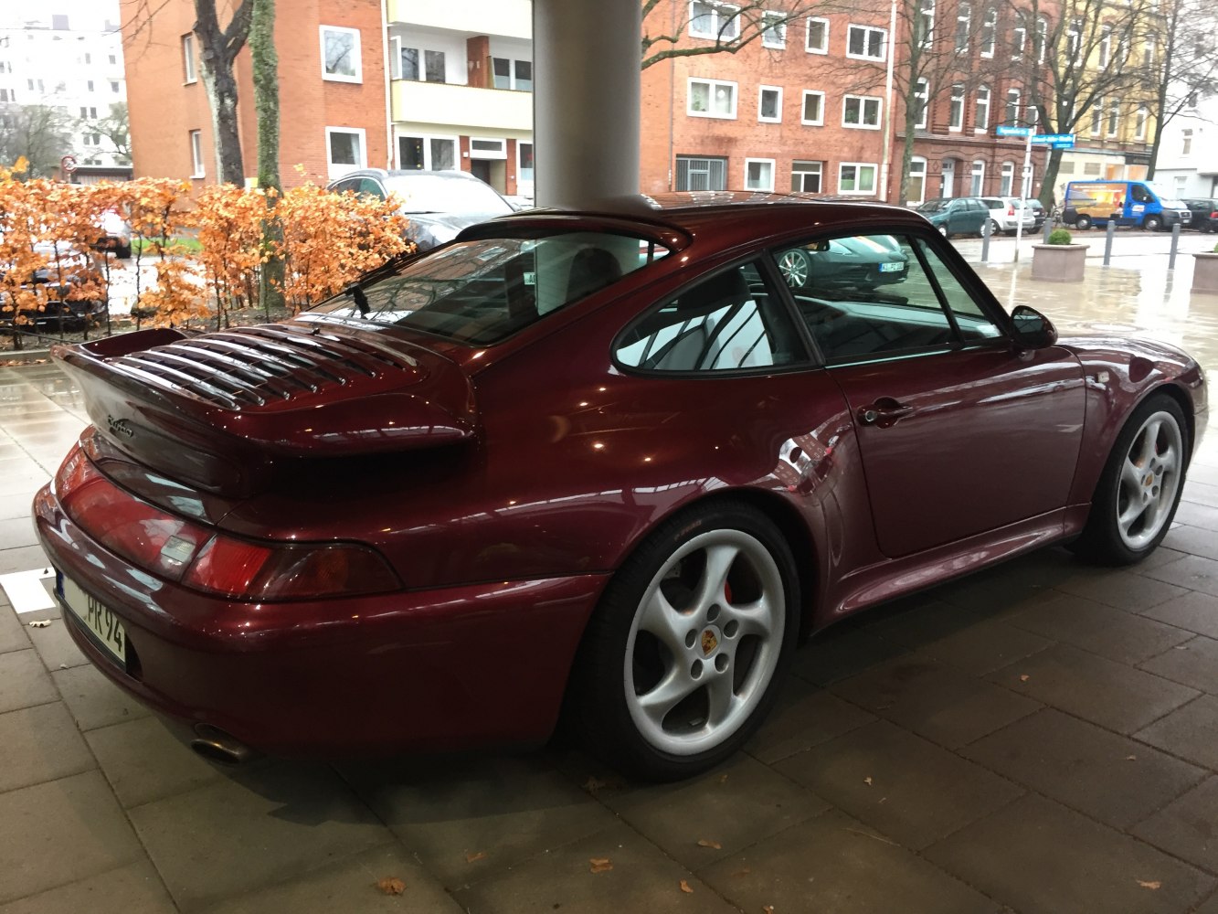 Rear view with iconic rear spoiler and smooth side curves