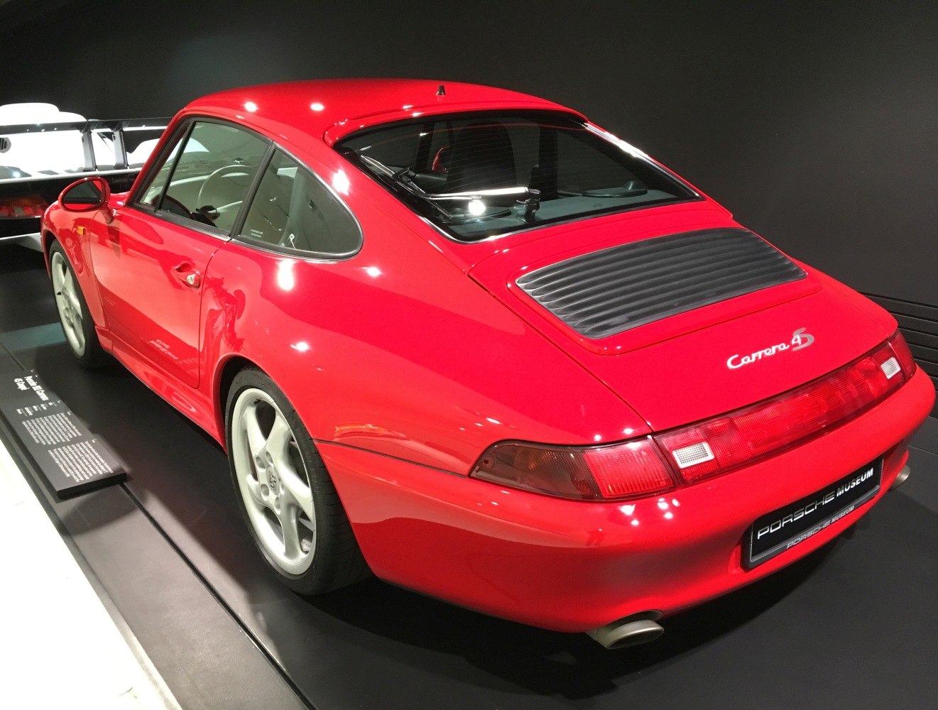 Rear view with rear grille and integrated taillights.