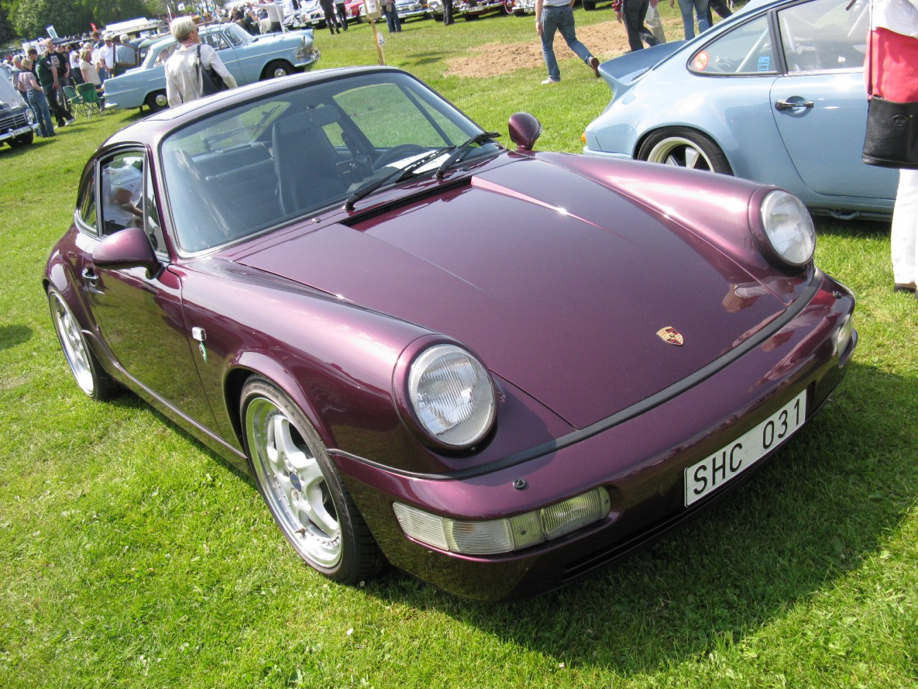 Classic sports coupe with round headlights and sleek front profile