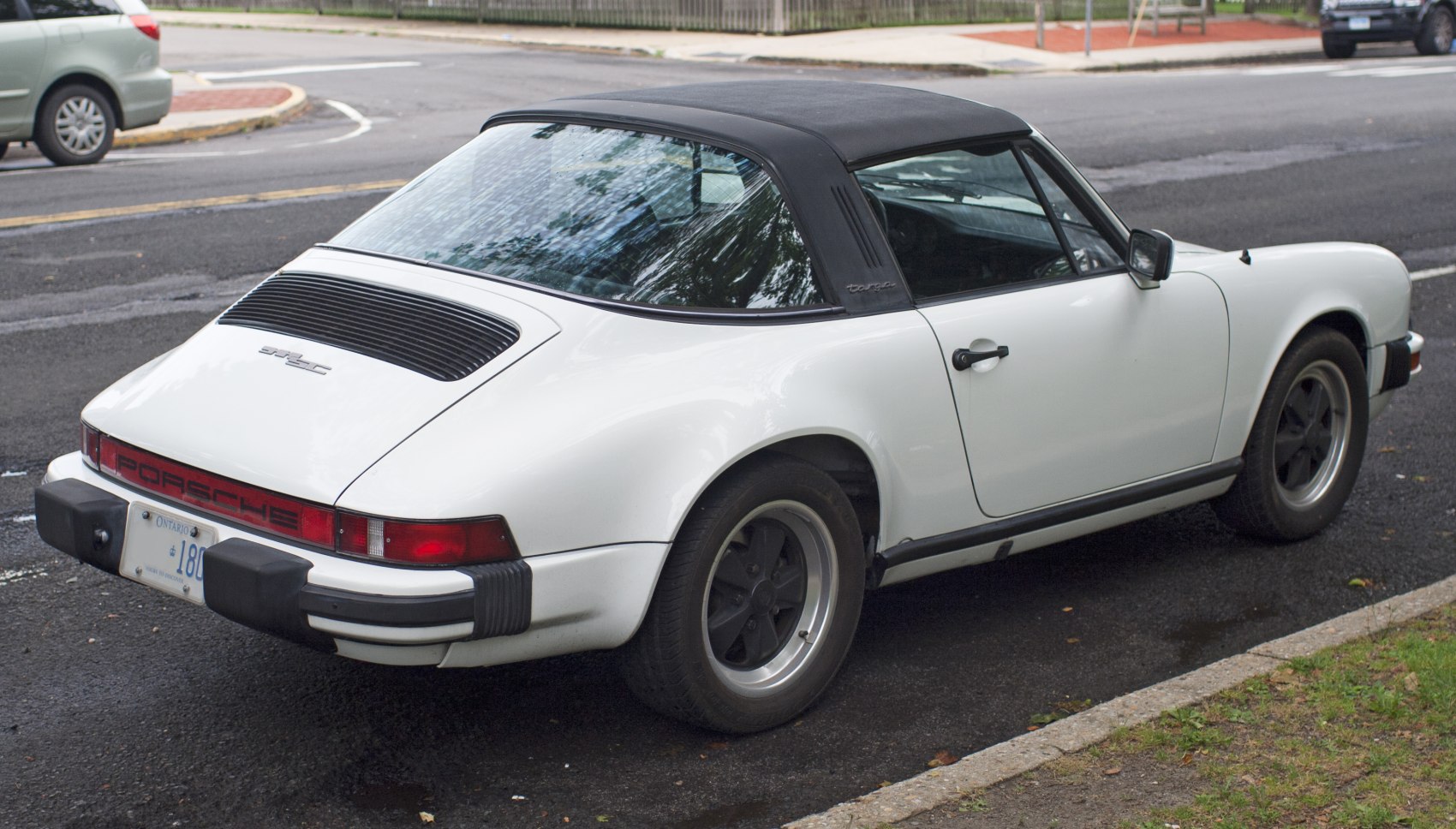 Rear view of classic Targa roof with unique rear bumper and vintage wheel design