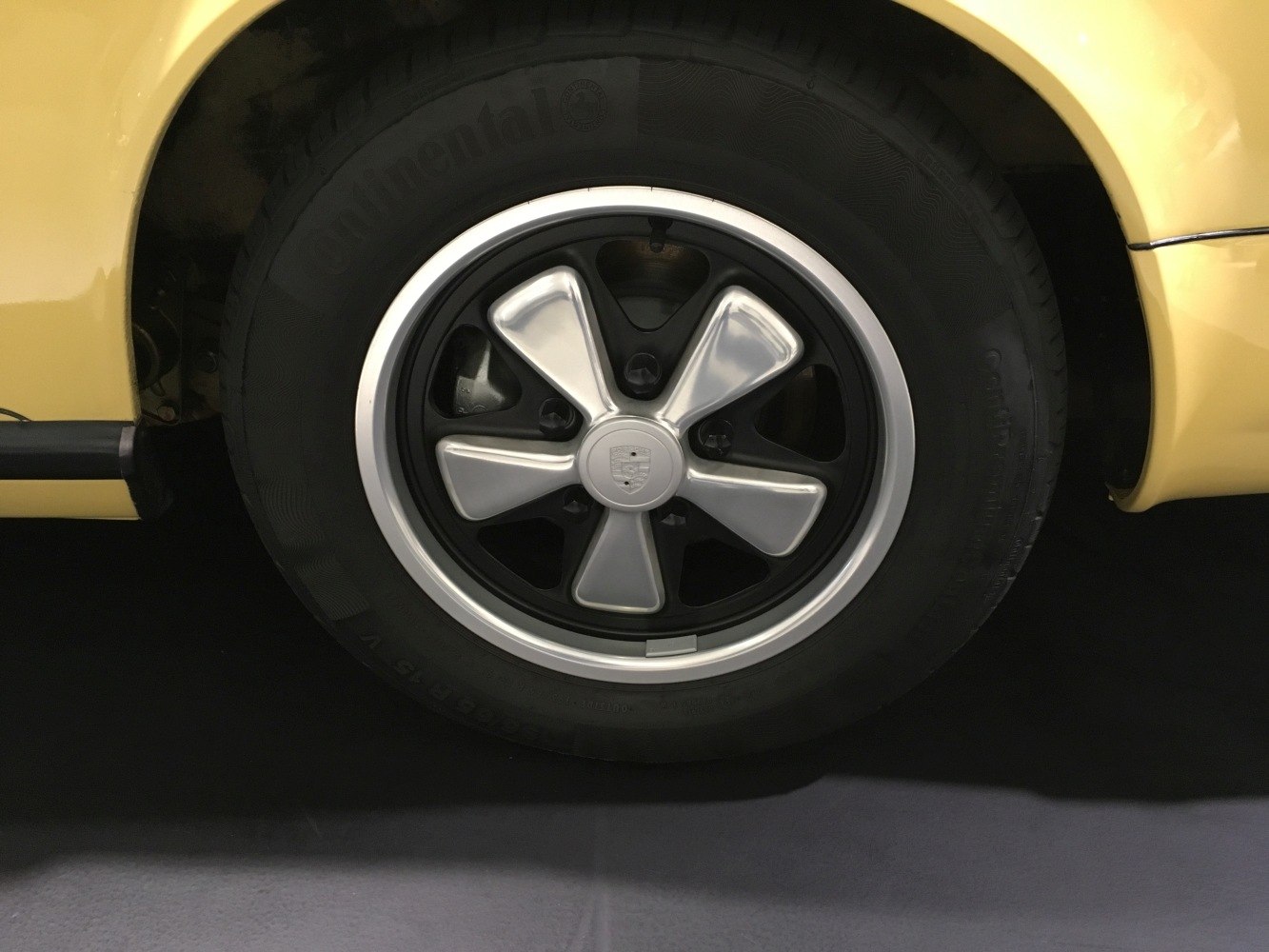 Fuchs alloy wheel with Continental tire on vintage car